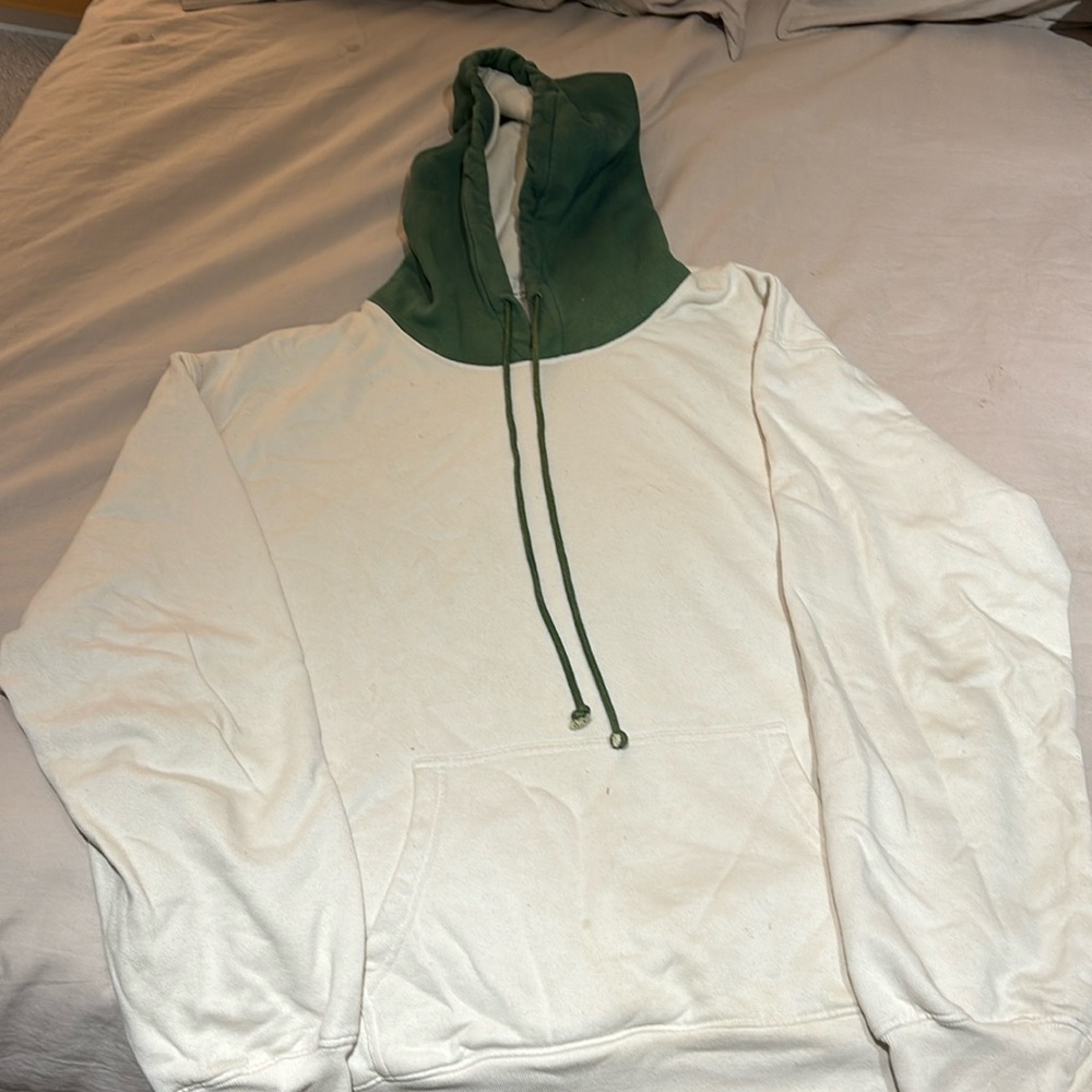 Cream hoodie with green hood